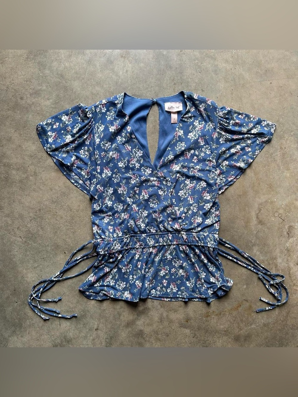 Blue floral wrap peplum blouse